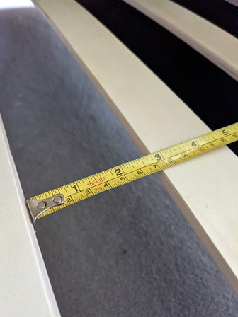Tape measure showing gaps between slats