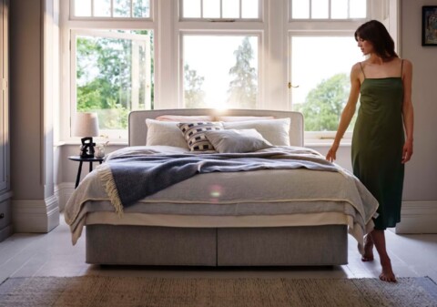 Vispring Elite Mattress with woman in green dress