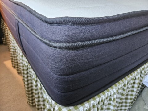 Origin Hybrid Pro Mattress corner on divan